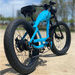 BLITZINbikes Coral 250 Watt Electric Bike in Gloss Coral Blue Rear Side View Outside