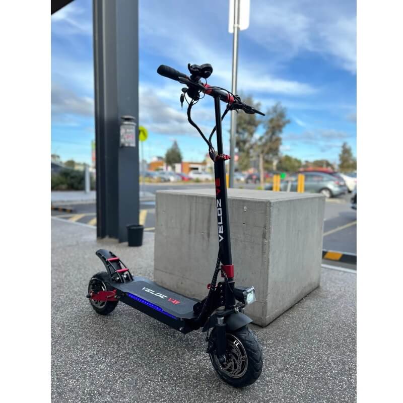 Veloz V2 2400W Keylock + Puncture Proof Tyres + App All Terrain Dual Motor E-Scooter in Black/Red