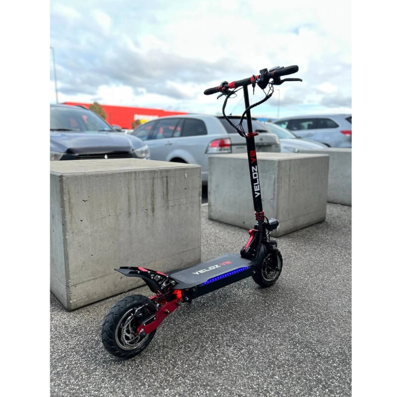 Veloz V2 2400W Keylock + Puncture Proof Tyres + App All Terrain Dual Motor E-Scooter in Black/Red