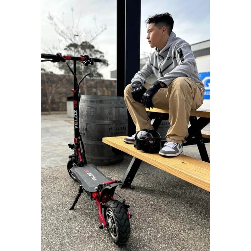 Veloz V2 2400W Keylock + Puncture Proof Tyres + App All Terrain Dual Motor E-Scooter in Black/Red