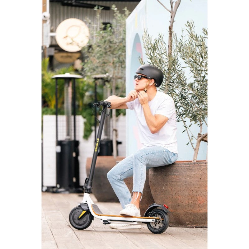 c40-electric-scooter-in-colour-black-and-white-with-a-male-model